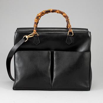 GUCCI, a leather bag/briefcase.