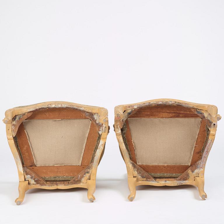 A pair of Swedish Rococo fauteuils à la reine, Stockholm, later part of the 18th century..