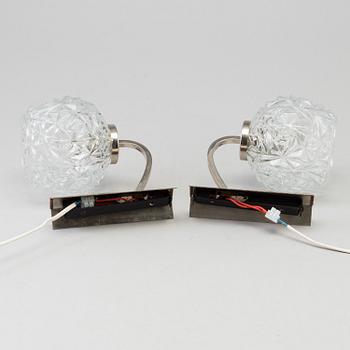 CARL FAGERLUND, a brass and glass Orrefors wall light, and a pait of wall lamps, unknown designer, 1960/70s.