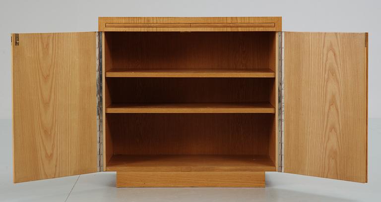 A Swedish elm cabinet attributed to Uno Åhrén, 1930's.