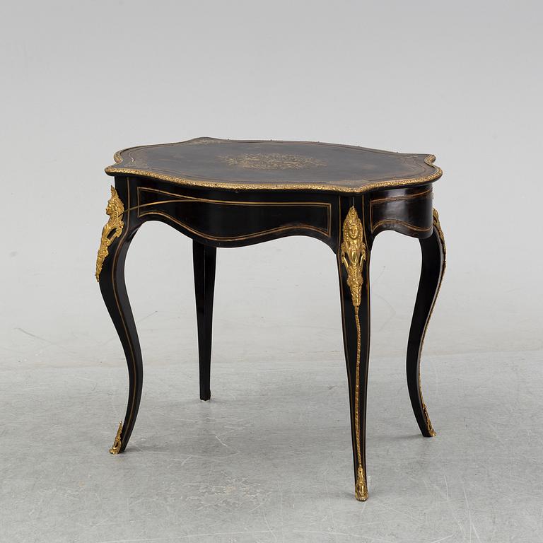 A Louis XV style table, early 20th Century.