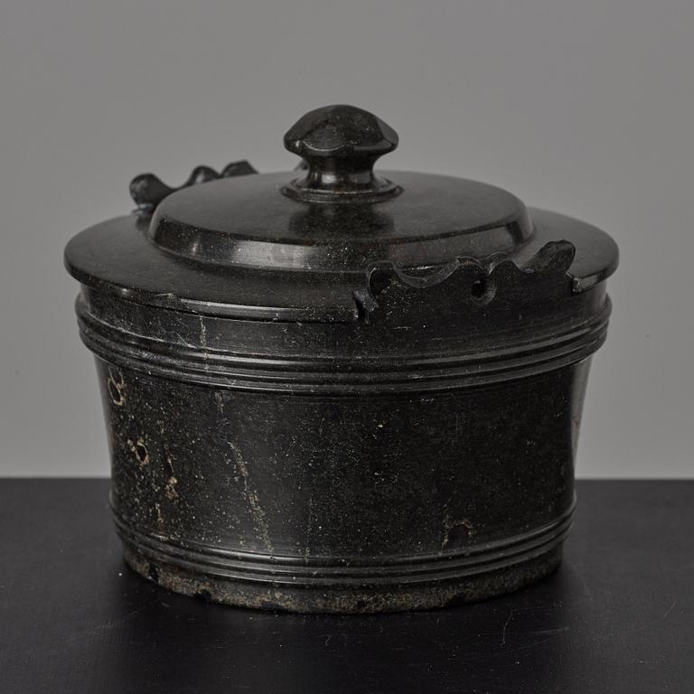 A serpentine stone butter box and cover circa 1800.