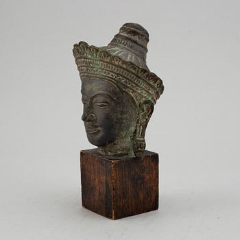 A Burmese sculpture of a buddhas head, 20th Century.