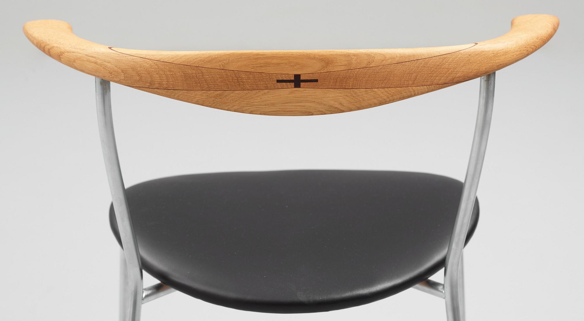 Hans J. Wegner, a set of six "JH-701" oak and black leather chairs by Johannes Hansen, Denmark.