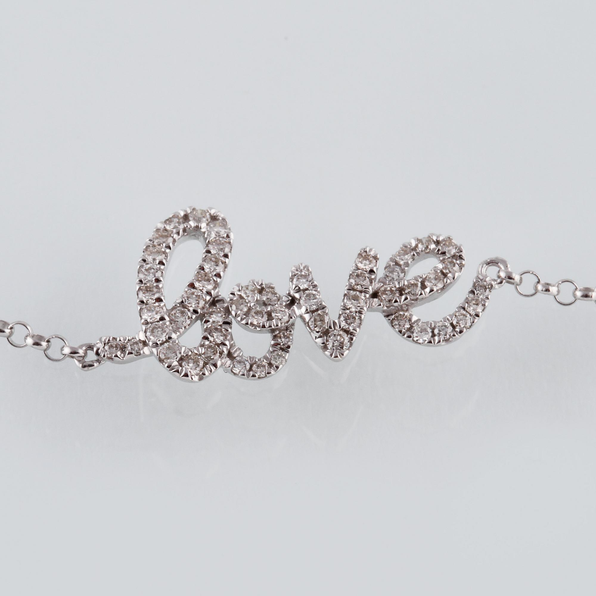 ARMBAND, 18K vitguld med briljantslipade diamanter ca 0.22 ct. Vikt 1,6 gram.