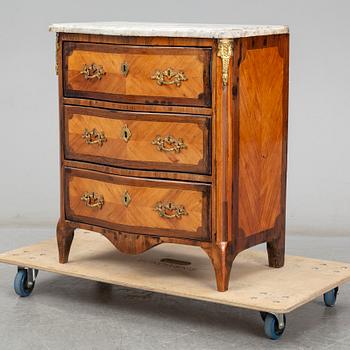 A Louis XV style chest of drawers, probably France, second half of the 19th century.