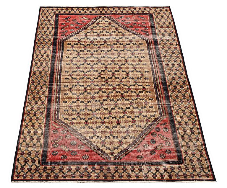 An oriental rug, vintage design, ca. 205 x 124 cm.