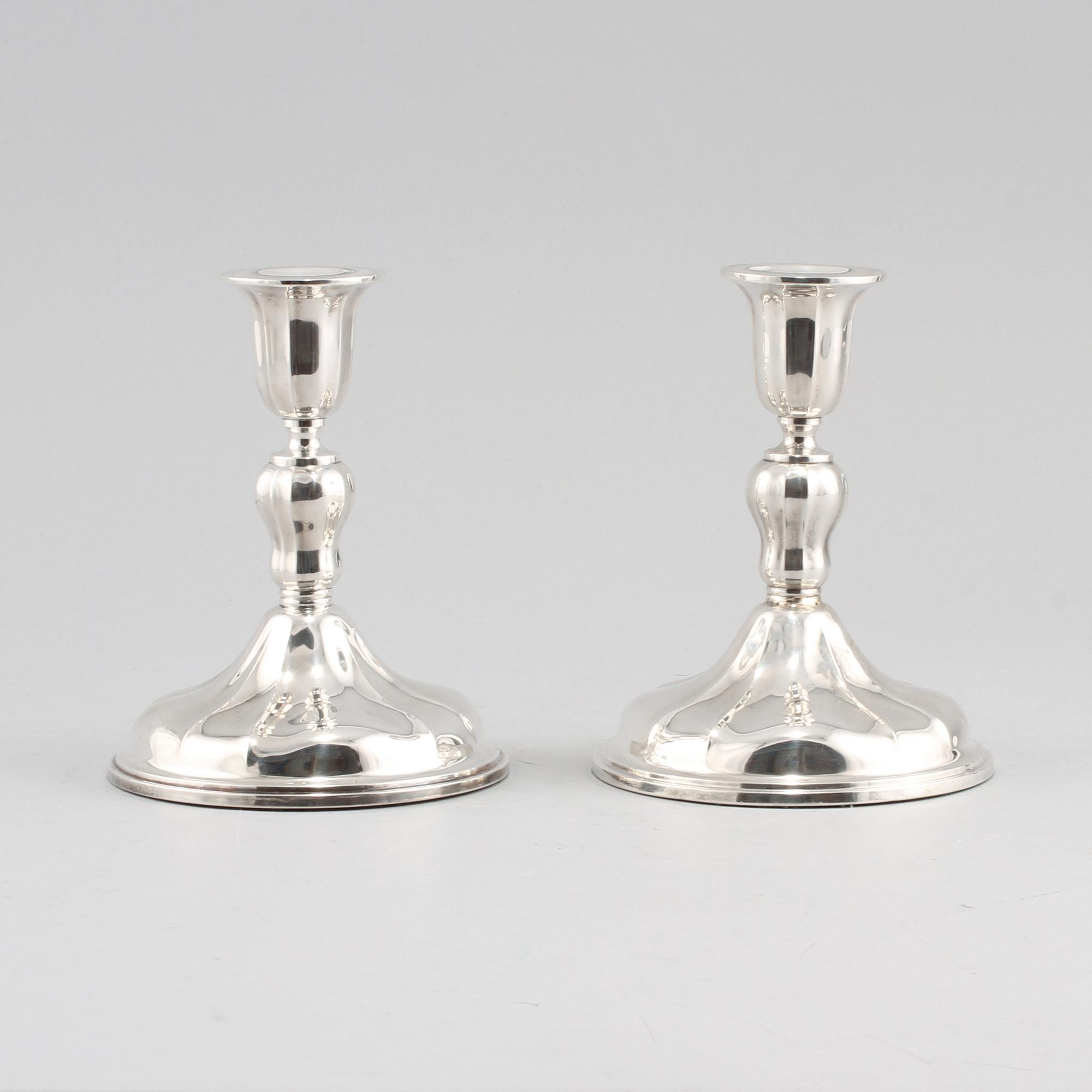 LJUSSTAKAR, ett par, silver, svenska importstämplar, 1900-tal.