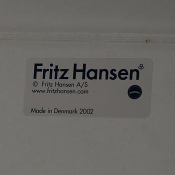 ARNE JACOBSEN, a table from Friz Hansen, Denmark, 2002.