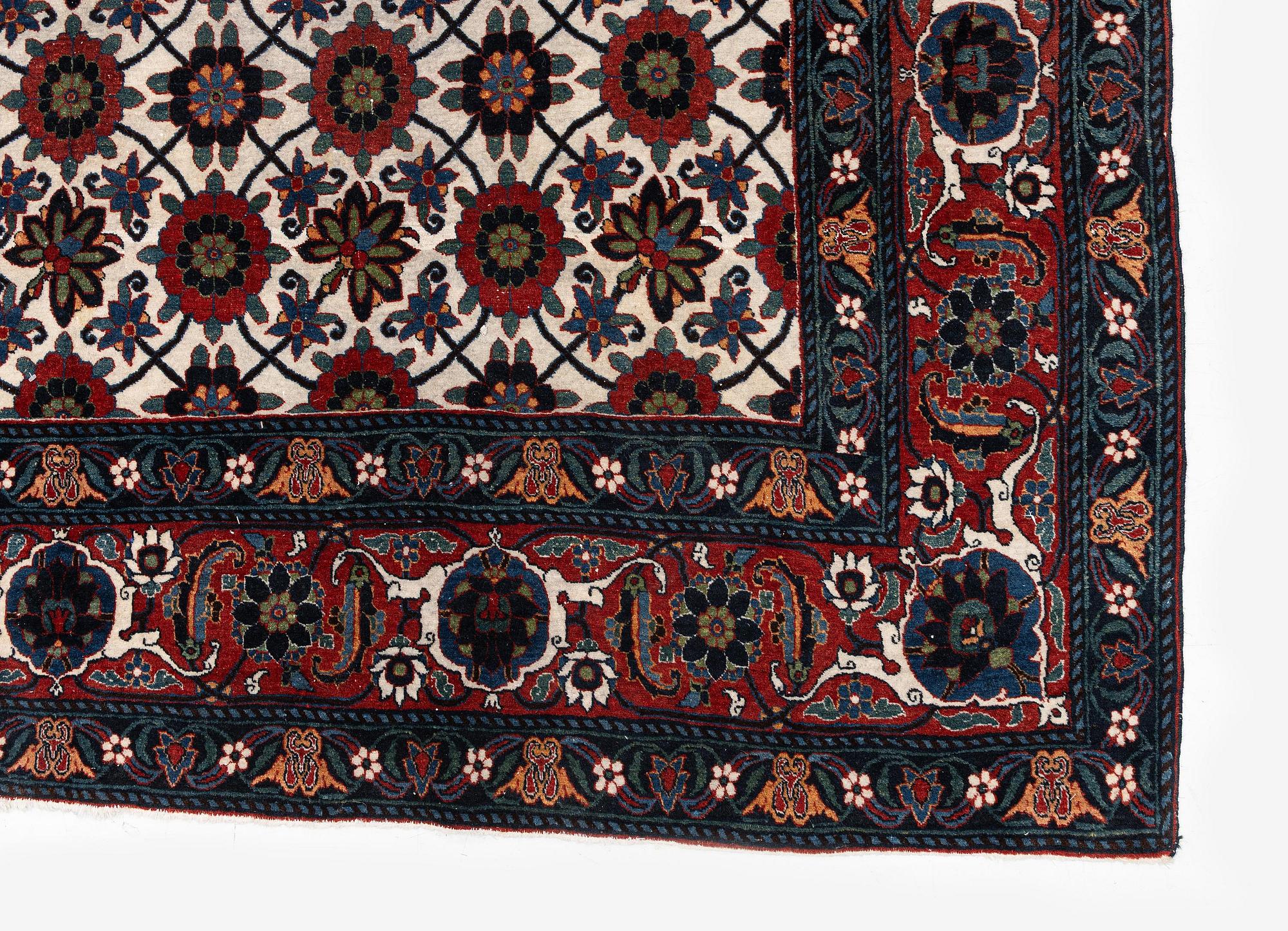 An antique Veramin carpet, West Persia, 380 x 271 cm.