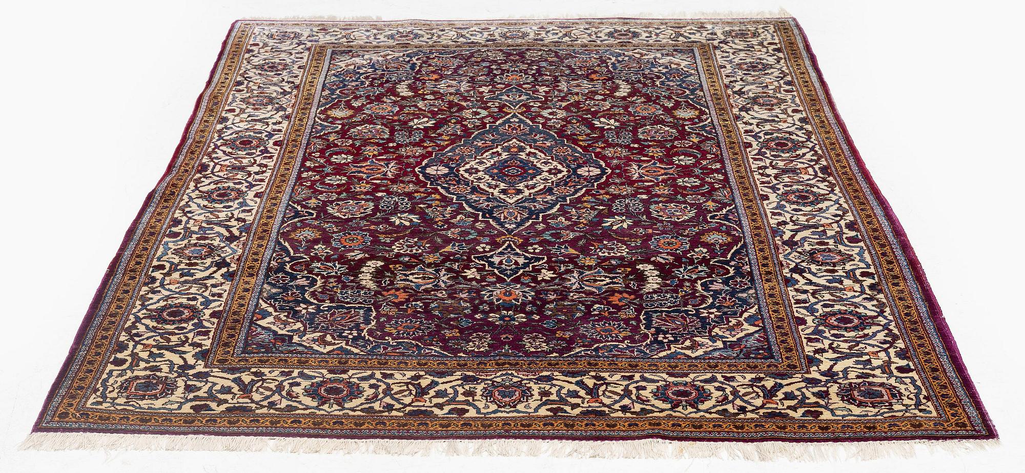 A semi-antique silk Keshan, 208 x 138 cm.