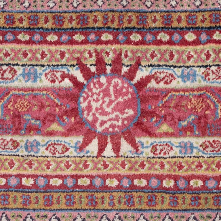 A oriental carpet, signed, c. 295 x 295 cm.