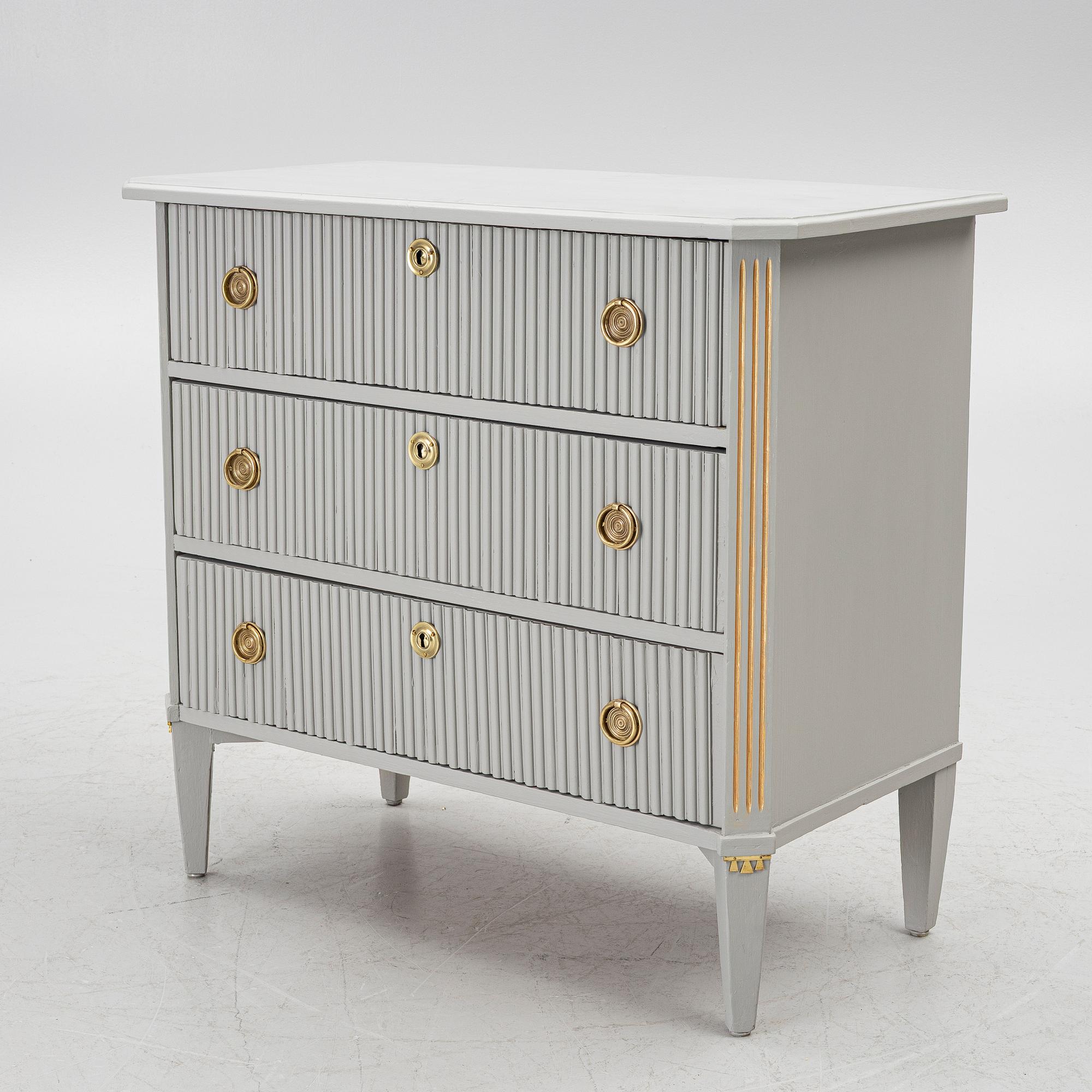 A Gustavian style chest of drawers, mid-20th century.