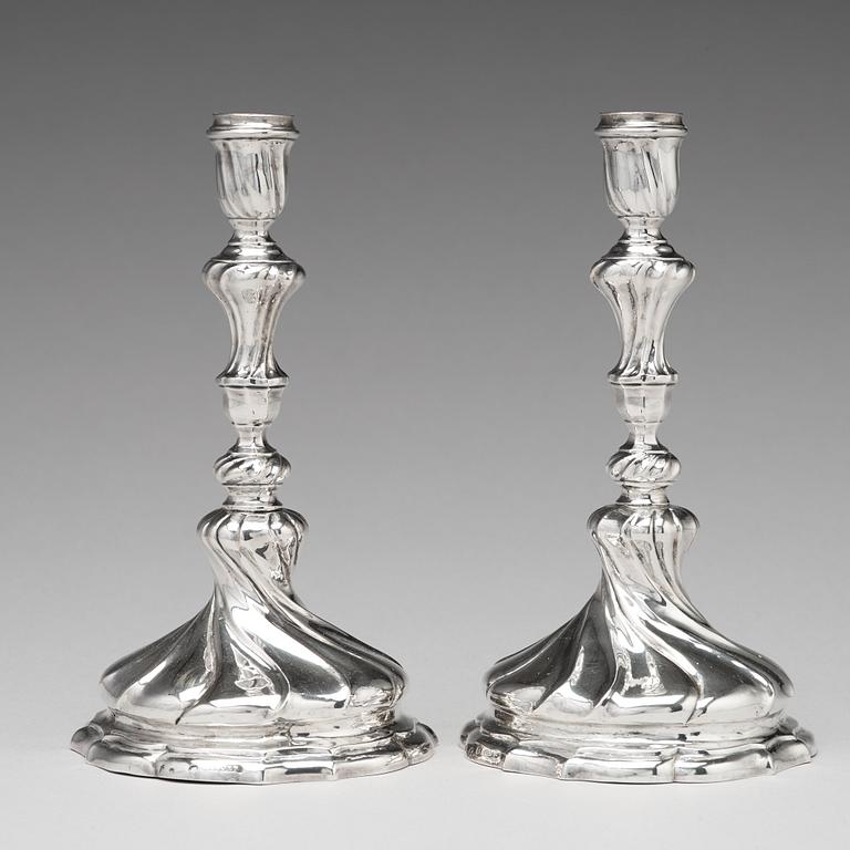 A pair of Swedish 18th century silver candlesticks, mark of Isak Sauer, Stockholm 1755.