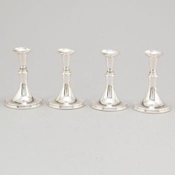 A set of four Swedish silver candlesticks, maker's mark Erik Löfman, Uppsala 1971-1973.