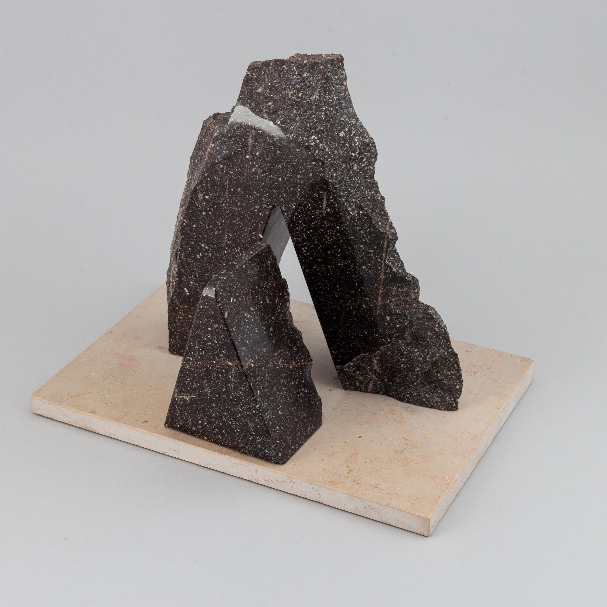 Lasse Brander, a sculpture, 3 parts, porphyry and light coloured stone. Signed and dated -95.
