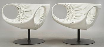 A pair of Patricia Urquiola 'Smock' steel and white leather easy chairs, Moroso, Italy.