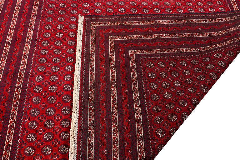 An Afghan carpet, c. 292 x 200 cm.