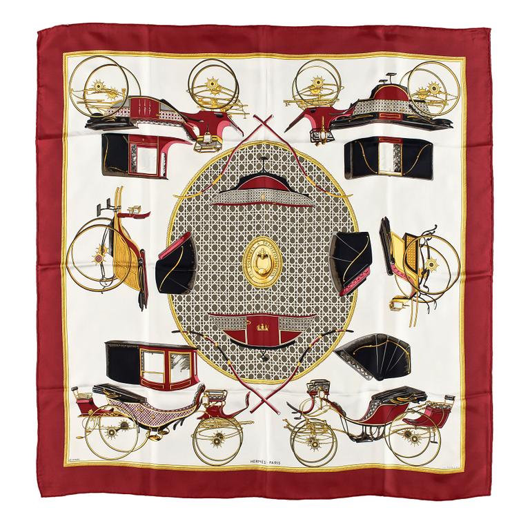 A silk scarf by Hermès, "Les Voitures a Transformation".