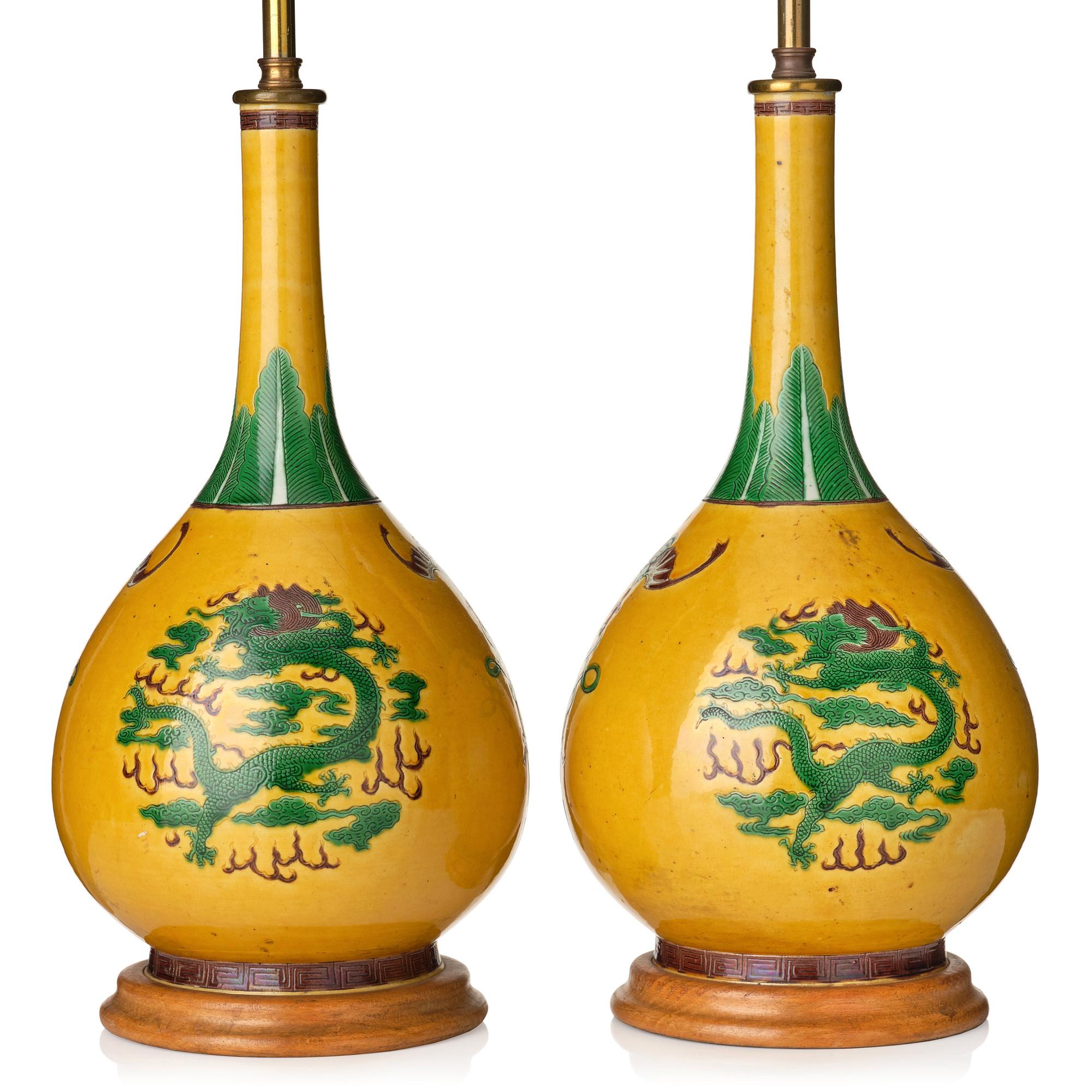 A pair of late yellow ground vases with five clawed dragons, late Qing dynasty.