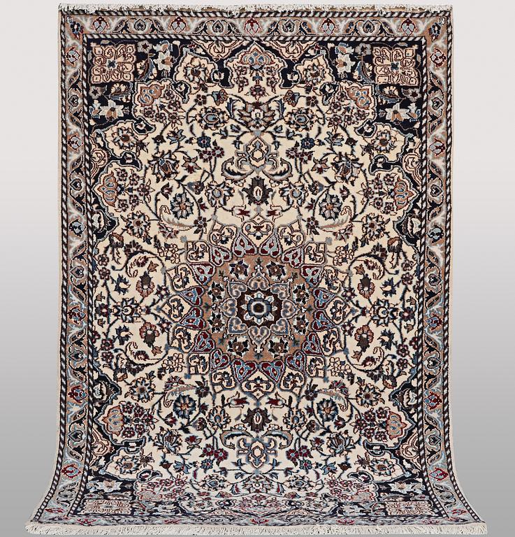 A rug, Nain, part silk, ca 196 x 120 cm.