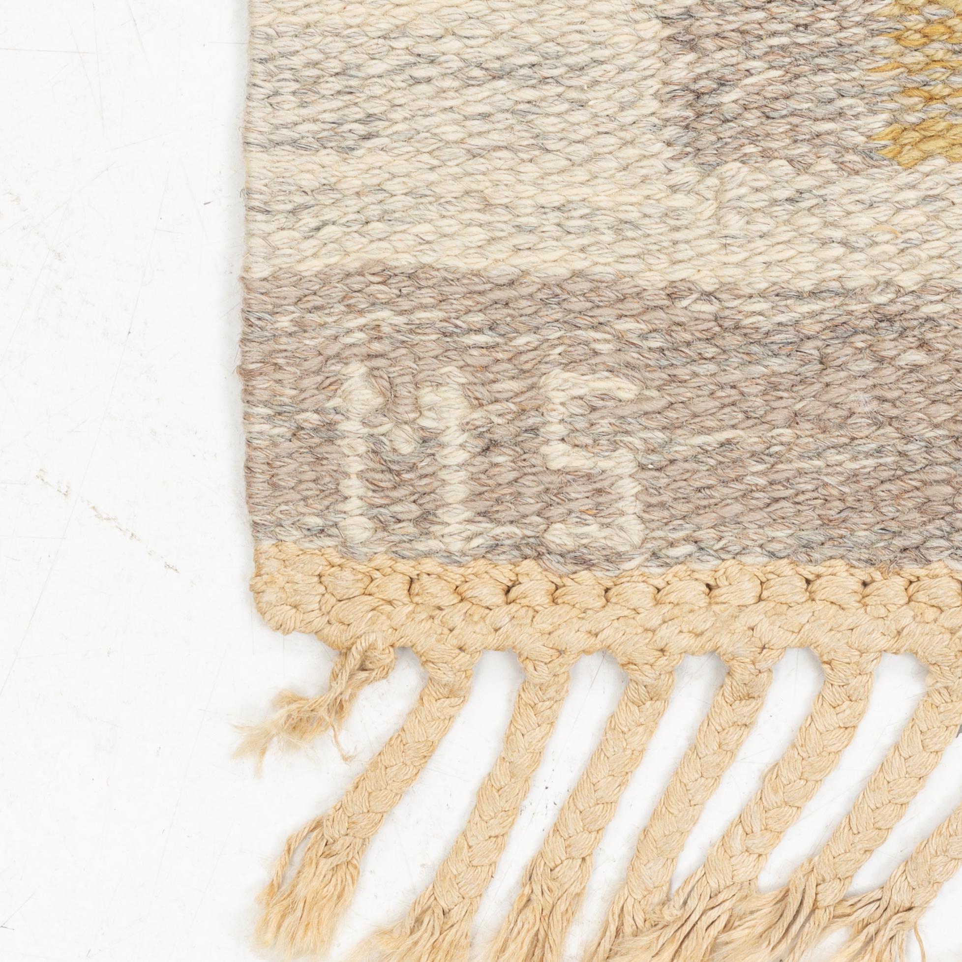 Mary Sandberg, a carpet, flat weave, circa 250 x 170 cm, signed MS KH.