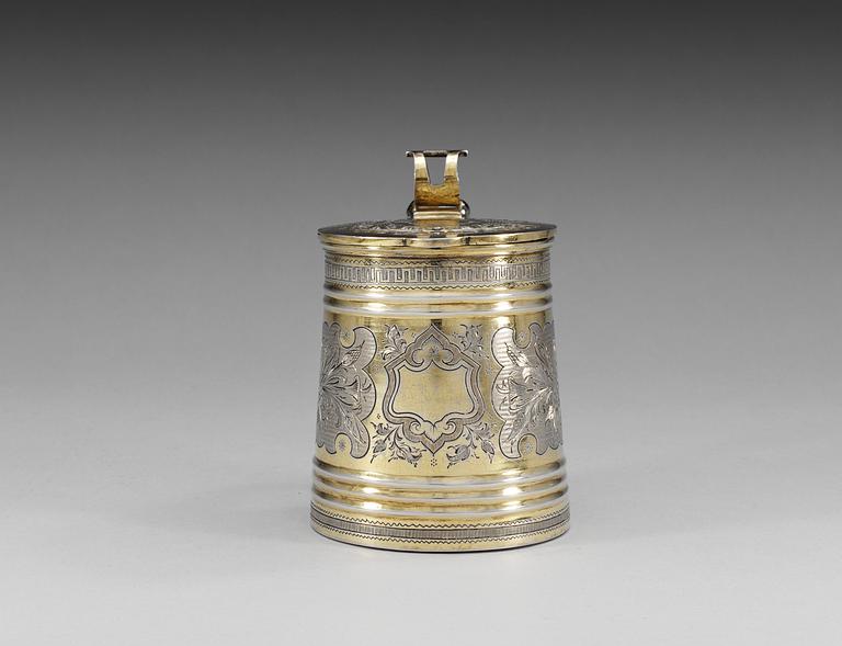 A RUSSIAN SILVER-GILT TANKARD, unidentified makers mark, Moscow 1874.