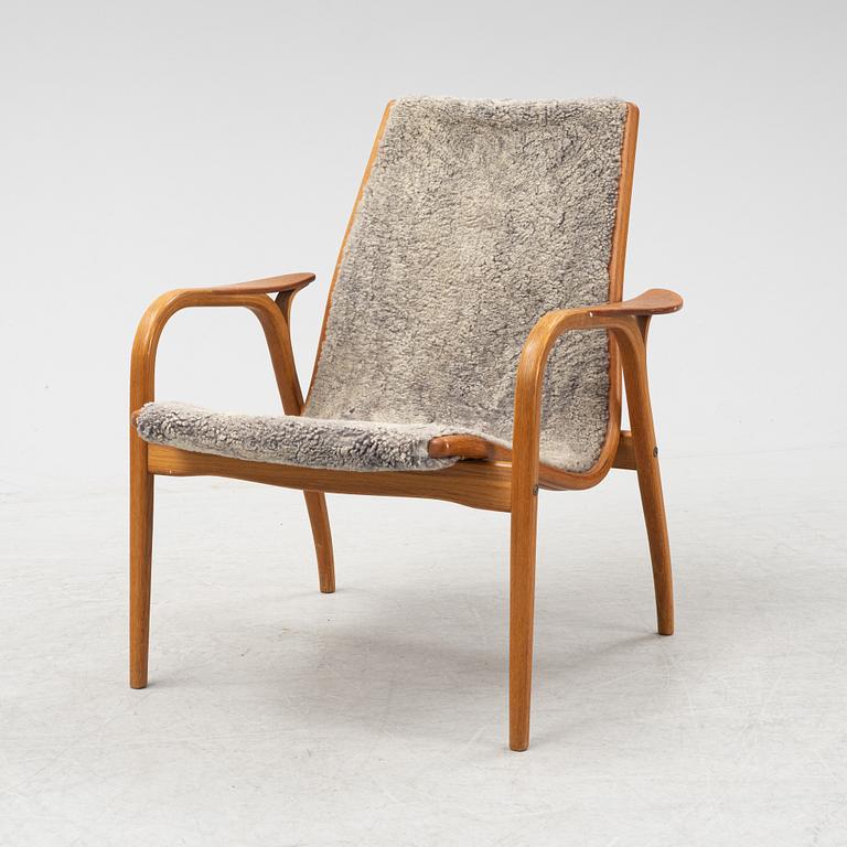 Yngve Ekström, a shearling 'Laminett' easy chair, Swedese.