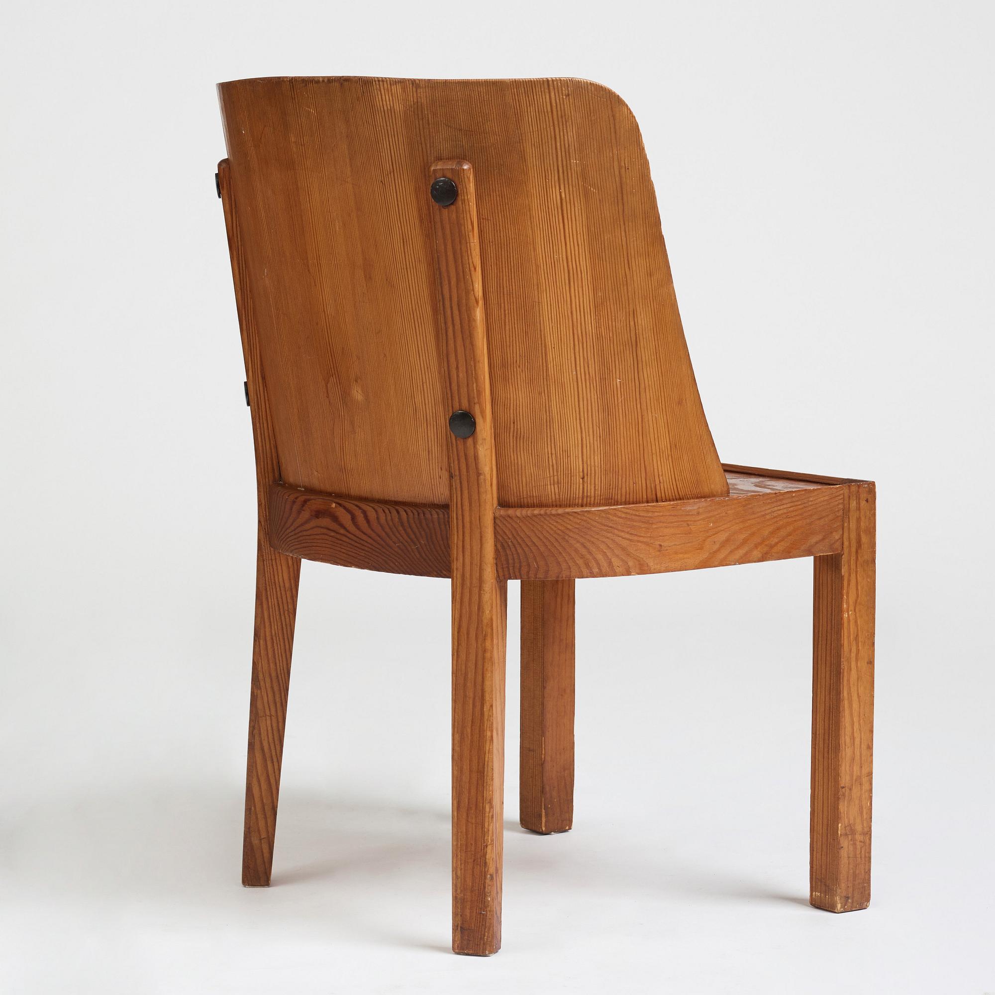 Axel Einar Hjorth, a stained pine low back "Lovö" chair, Nordiska Kompaniet, Sweden 1930's.