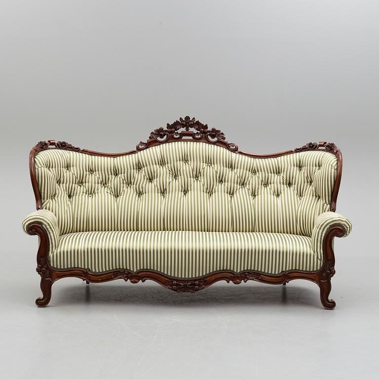 An end of the 19th century rococo style sofa.