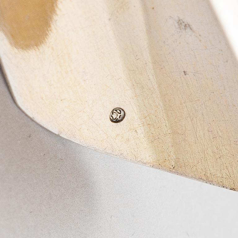 A Russian silver, parcel-gilt tea caddy spoon, Moscow from around the turn of teh century/ early 20th century.