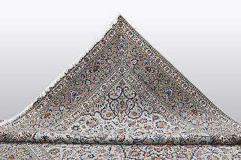 A carpet, Kashan, signed Fani, ca 420 x 300 cm.