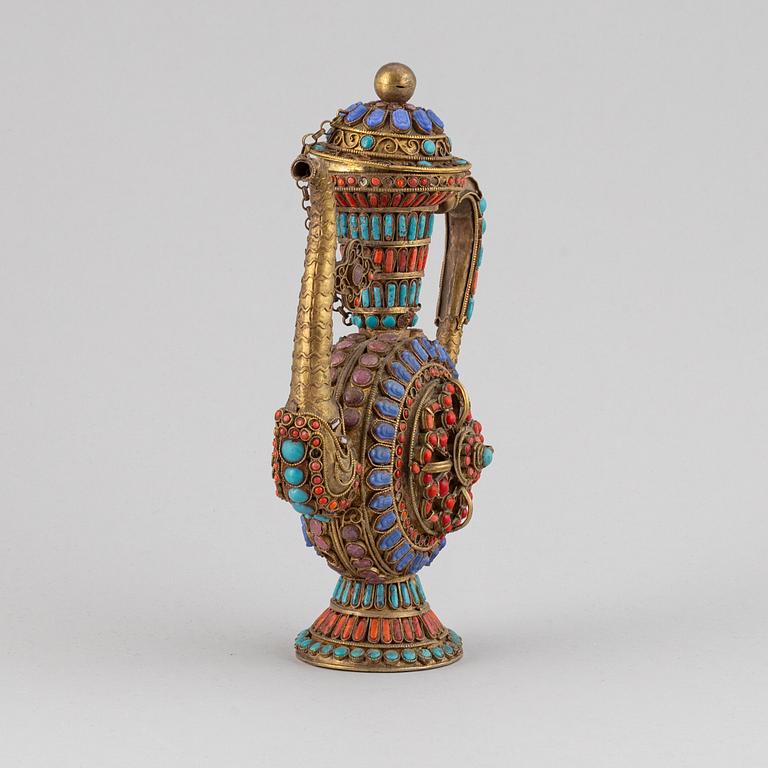 A Tibetan metal and stone inlay pot, 20th century.