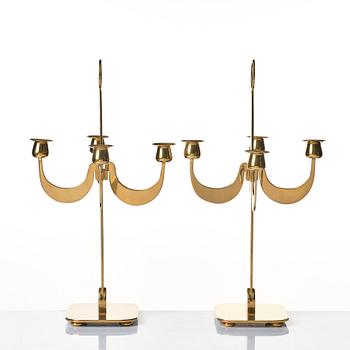 Josef Frank, a pair of brass candelabra by Svenskt Tenn, Sweden 1950's, model nr 2663.
