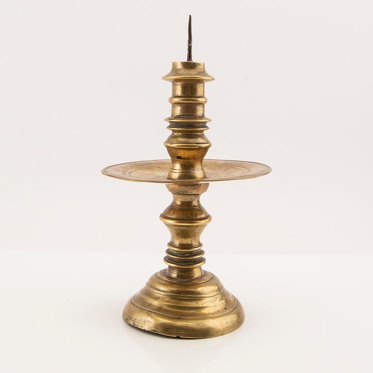 Candle holder possibly from the 17th century, brass.