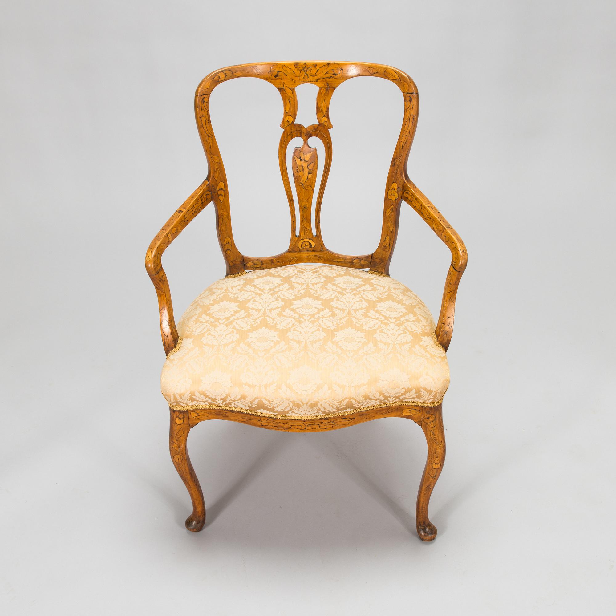 A Dutch 18th-century open armchair.