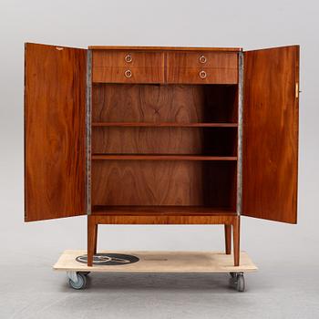A 1940's Swedish Modern mahogany cabinet from Möbelbolaget.