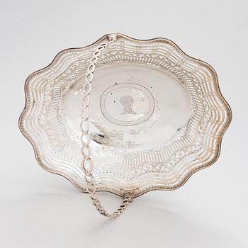 A George III sterling silver breadbasket, maker's mark of William Plummer, London 1777.