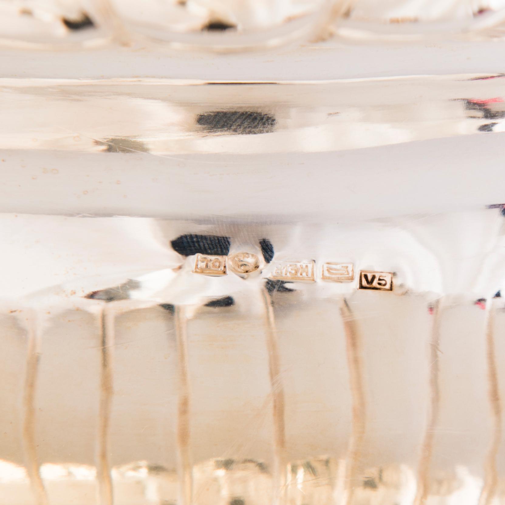 OSKAR LINDROOS, A parcel gilt bread basket, marked OL, Helsinki 1926.