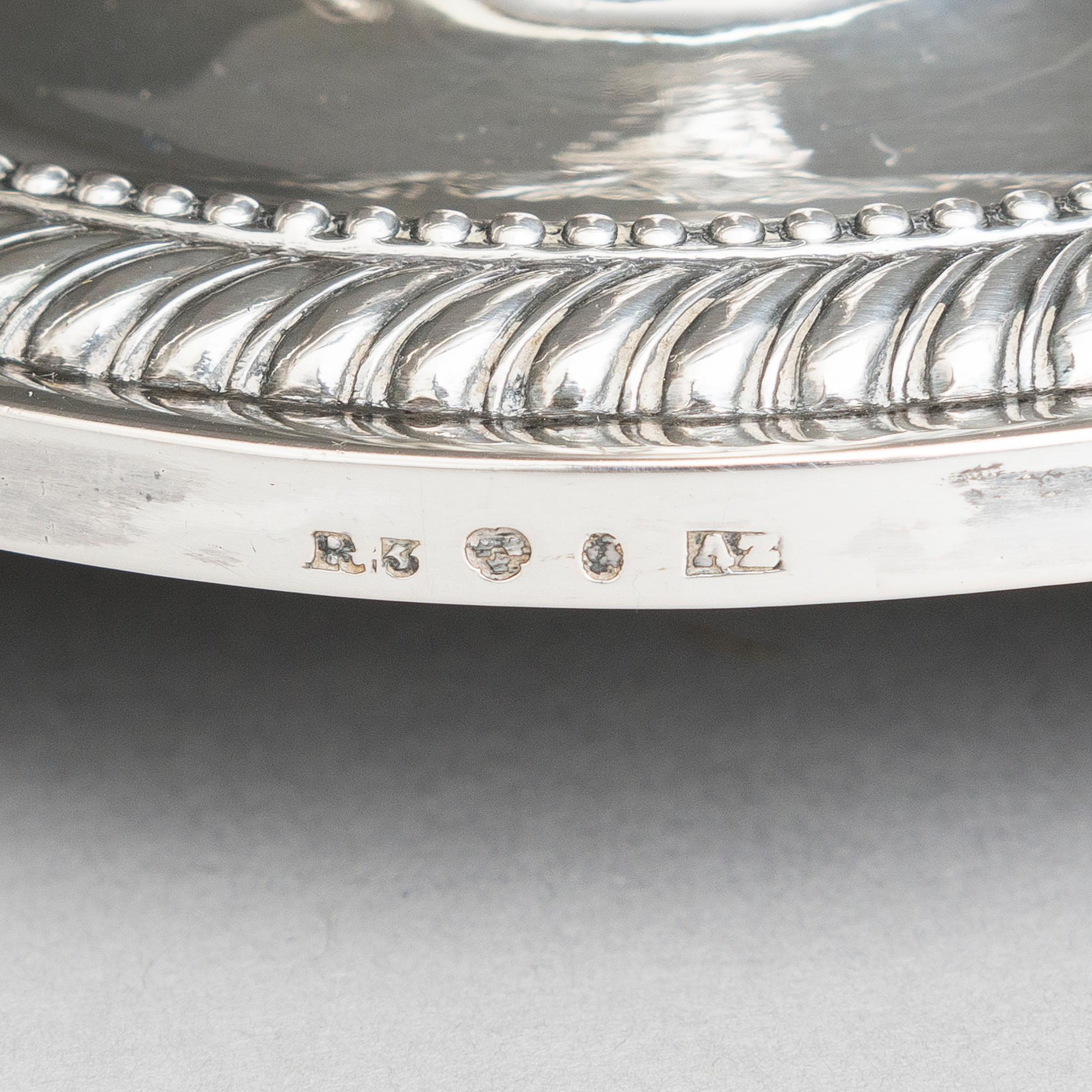 ADOLF ZETHELIUS, LJUSSTAKAR, ett par, silver, empire, Stockholm 1823.