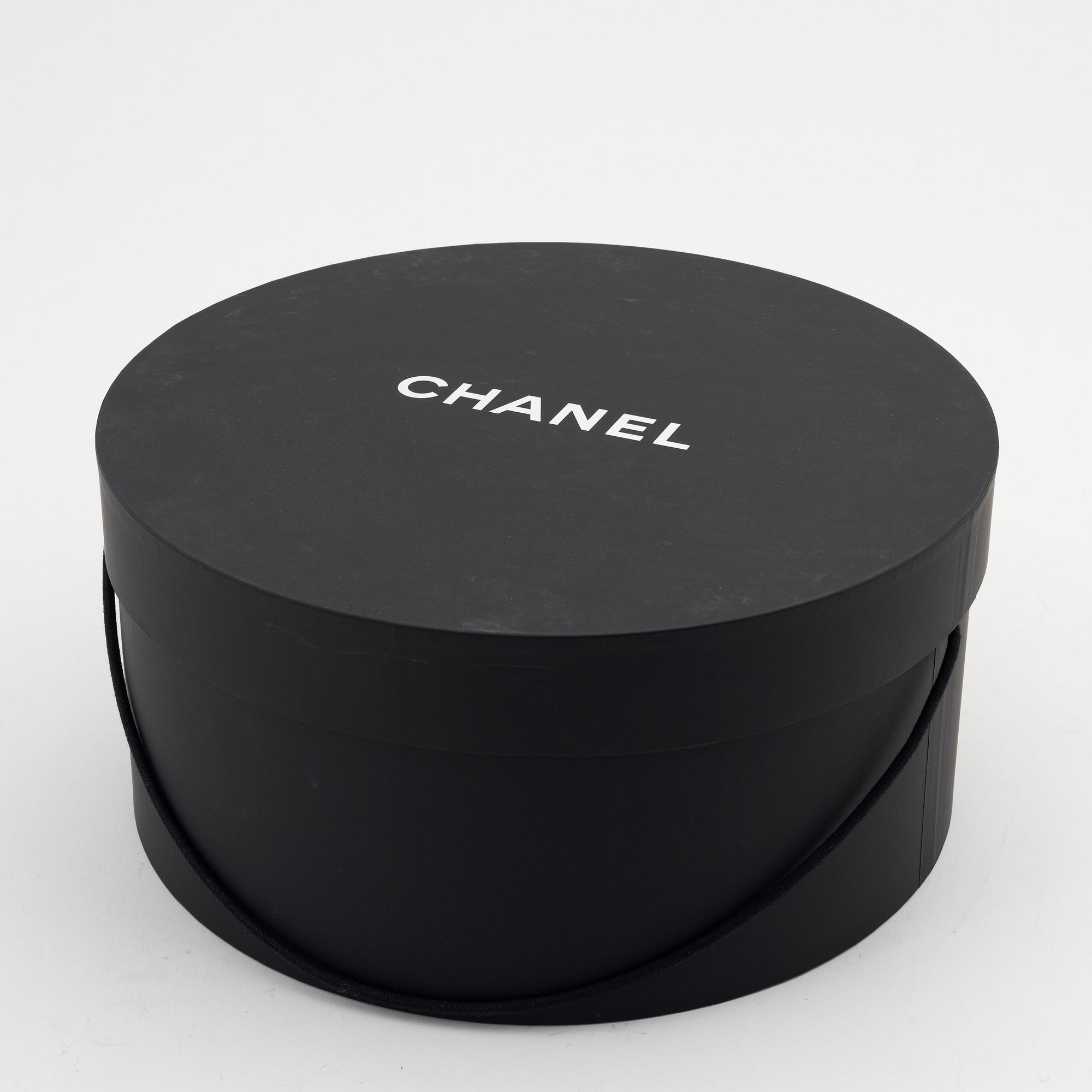 Chanel, a rabit hair hat with ribbon, size S.