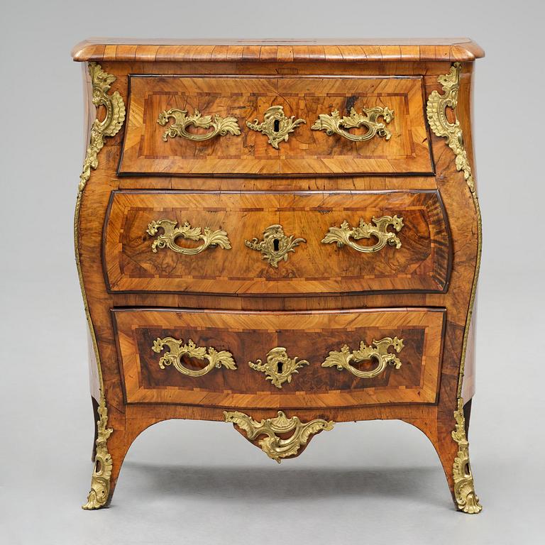 A Swedish rococo parquetry and gilt brass-mounted commode, Stockholm, later part 18th century.