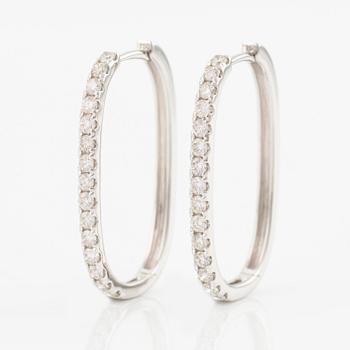 Earrings with brilliant-cut diamonds.