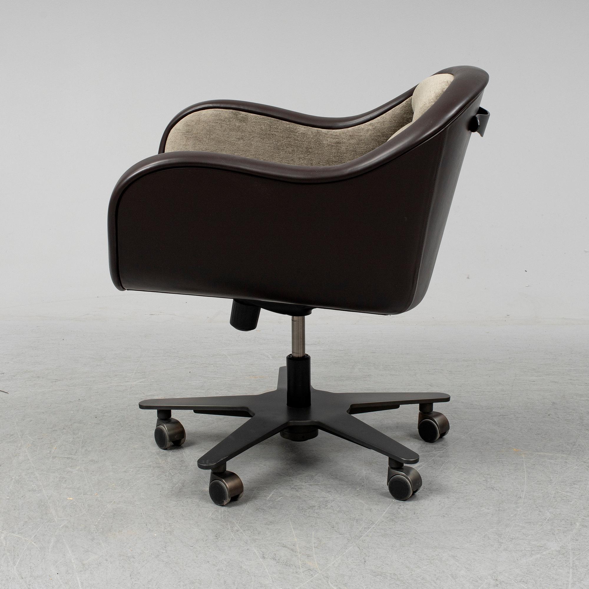 An contemporary 'Vittoria' office chair by Romeo Sozzi for Promemoria furniture.