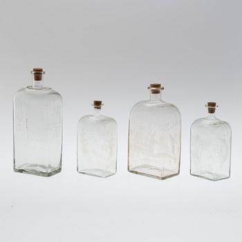 Four brandy bottles, 19/20th century.
