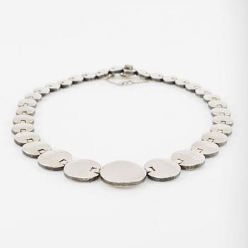 A silver necklace.