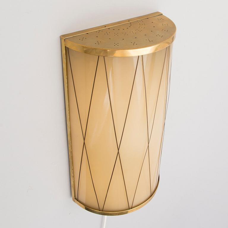 A mid 20th century '3061' wall light for Stockmann Orno, Finland.