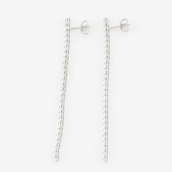 Brilliant-cut diamond line earrings.