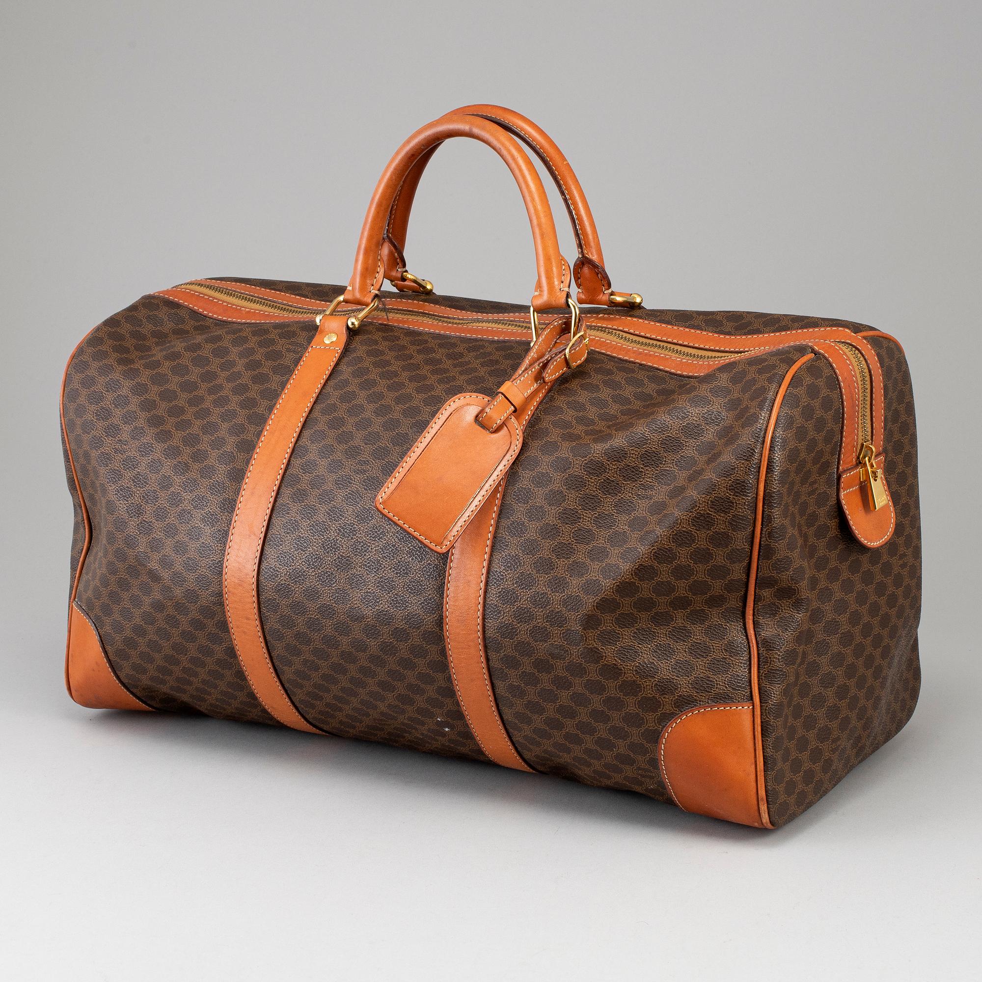 CÉLINE, a 'Macadam Duffle' bag.