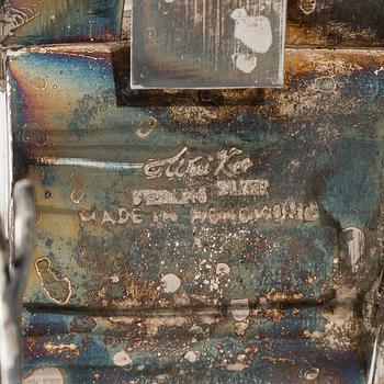 Four shakers in a pair of miniature rickshaws, sterling silver, maker's mark of Wai Kee, Hong Kong.